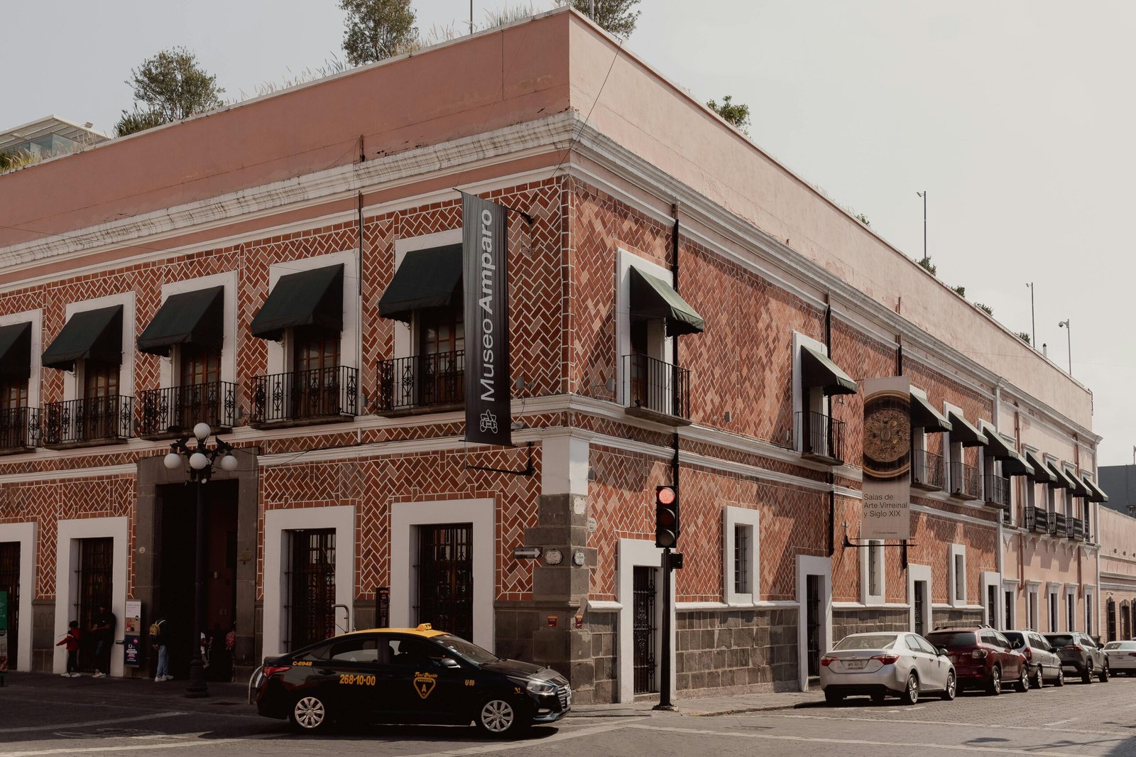 Street view of Museo Amparo, a historic landmark in Puebla, Mexico.